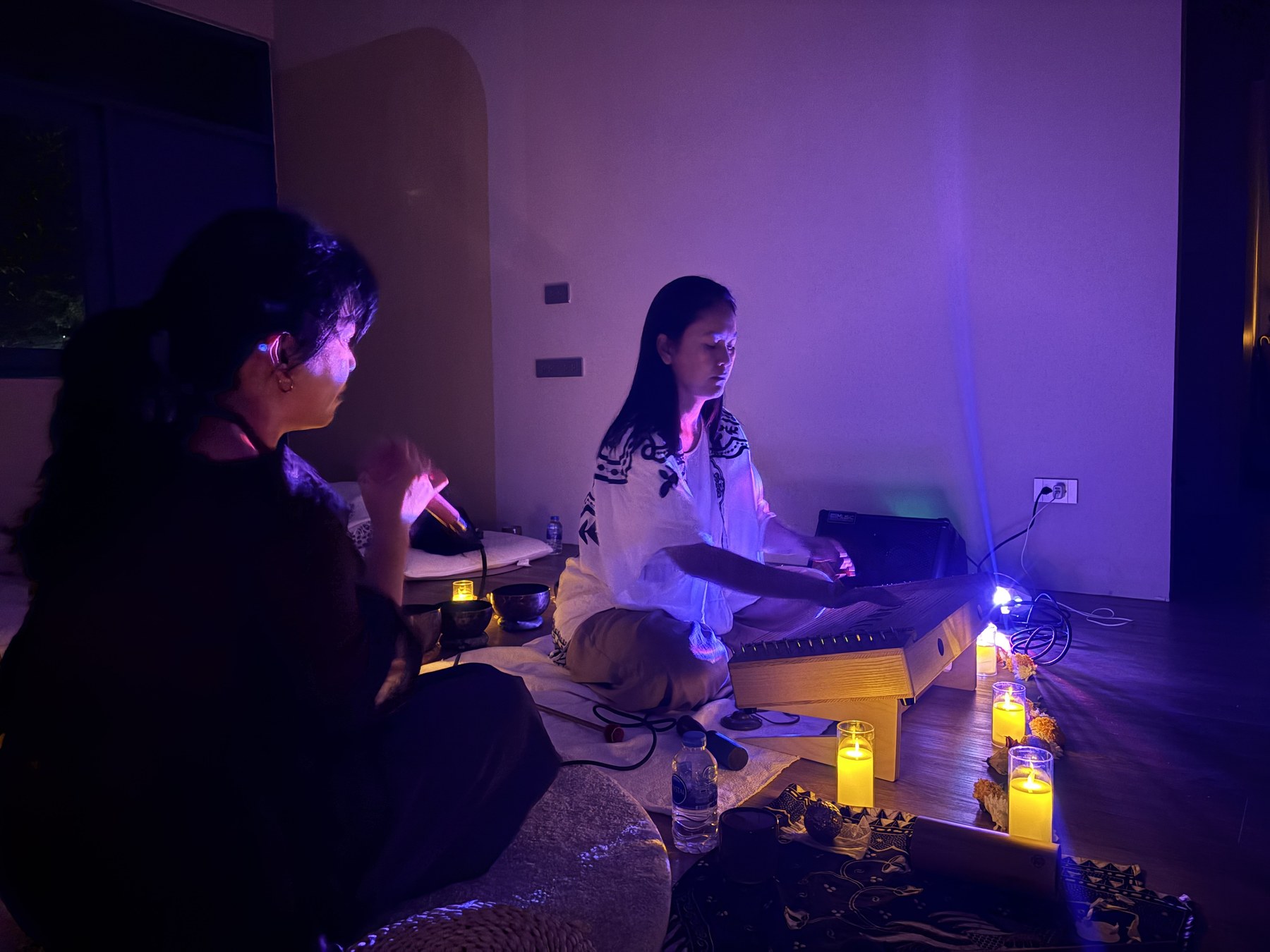 Guests and facilitators sharing a sound healing session at Soulwaves